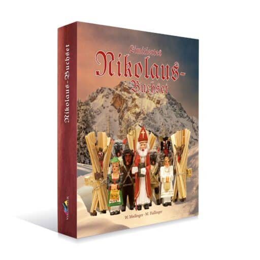 Buch mit dem Titel 'Nikolaus-Buchset' zeigt eine Schneelandschaft mit Bergen im Hintergrund und eine Gruppe von handgefertigten Figuren des Nikolaus und seiner Begleiter vorne, die aus Holz und Stoff bestehen.